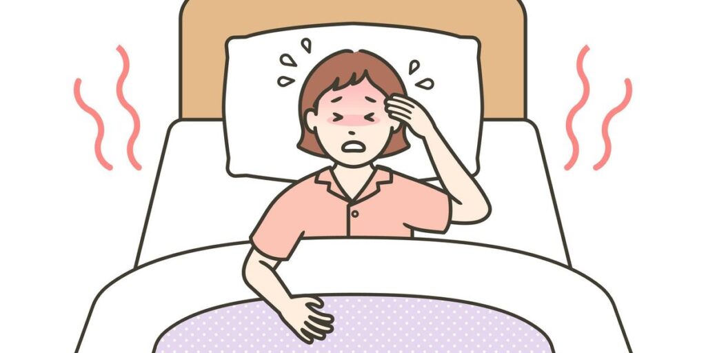 Mulher dormindo tranquilamente em um ambiente escuro e fresco, simbolizando a melhora do sono durante a menopausa.